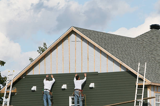 Professional Siding technician working in Preston, TX